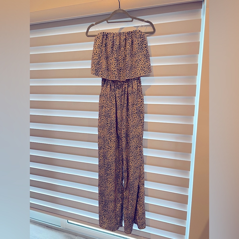 Tube top jumper with pockets never worn size large animal print.
